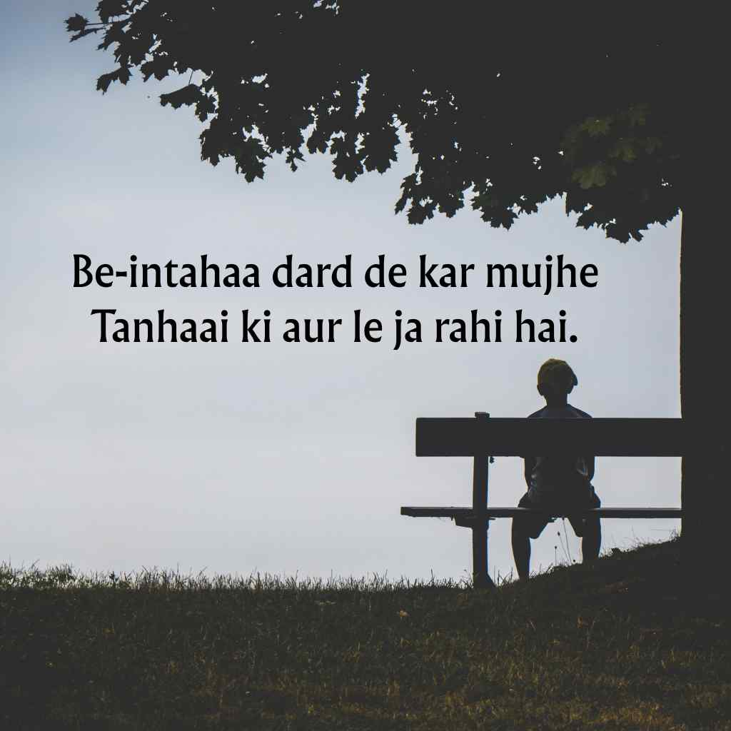 Alone person sitting on park bench with tanhaai aur be-intahaa dard shayari