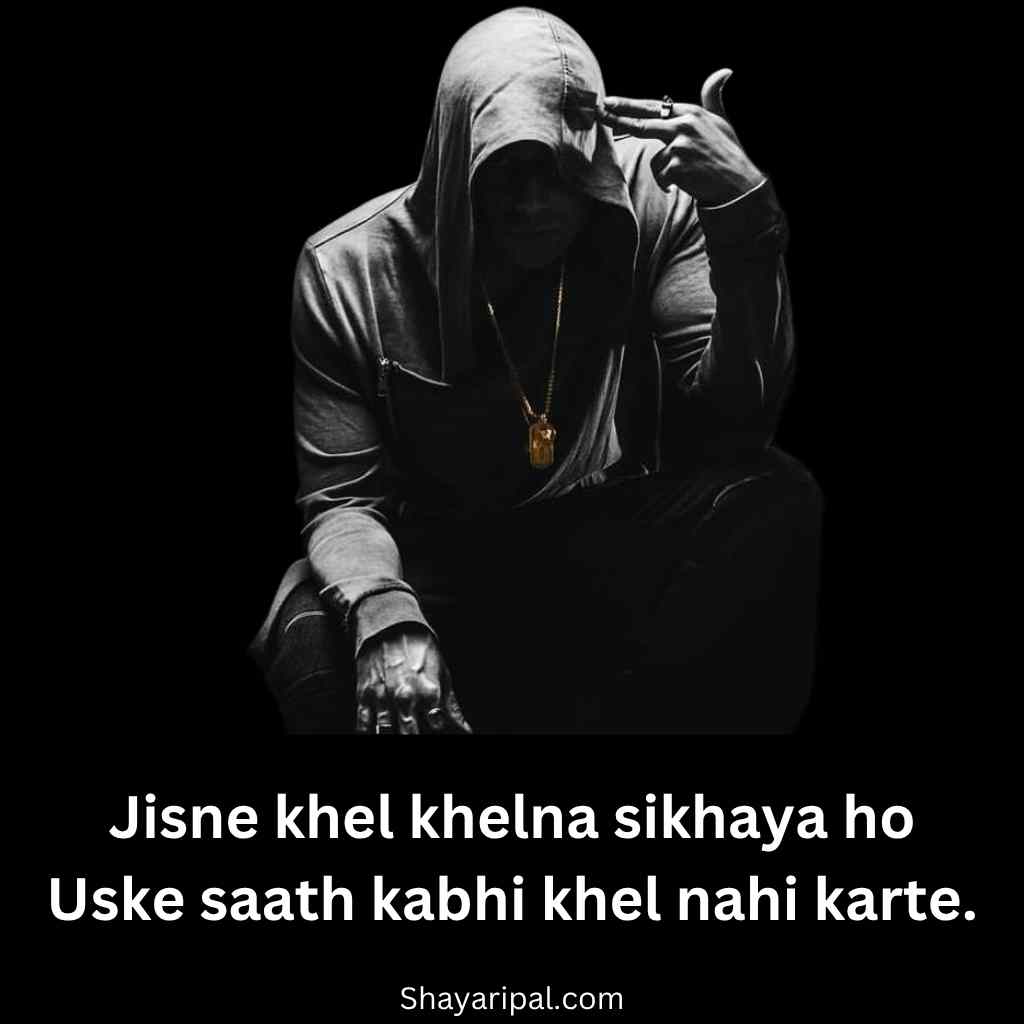 Hooded man with attitude pose and powerful attitude shayari in English quote